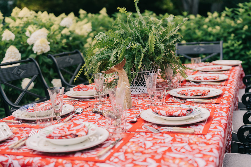 Tablescape with red rouge chintz tablecloth cotton India print